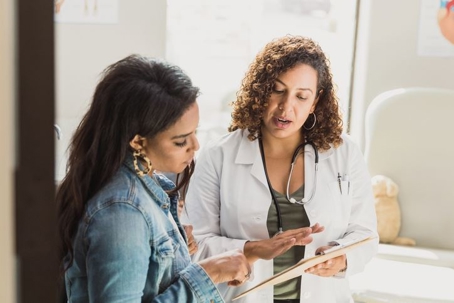 doctor talking to patient