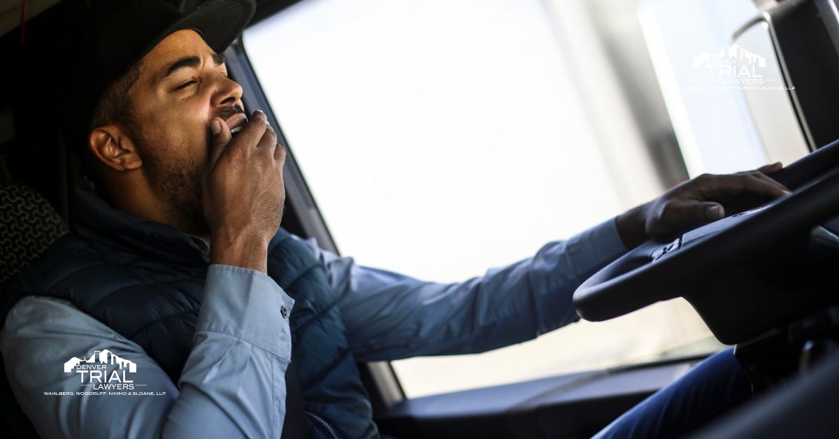 Truck driver yawning.