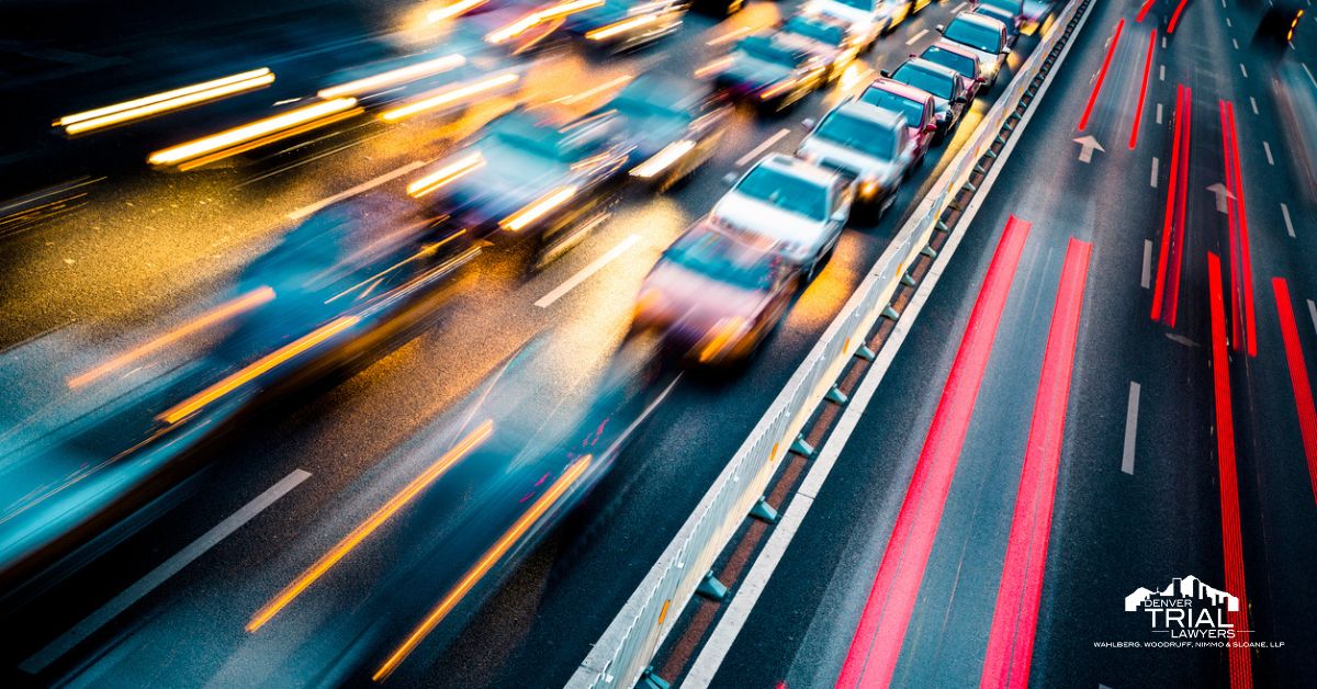 Heavy traffic with blurred bright light effects to portray speed.